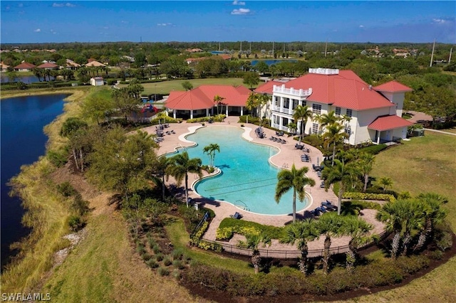 drone / aerial view with a water view