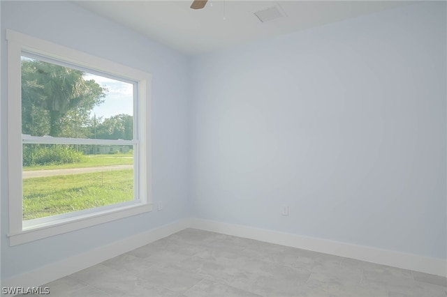 unfurnished room featuring ceiling fan