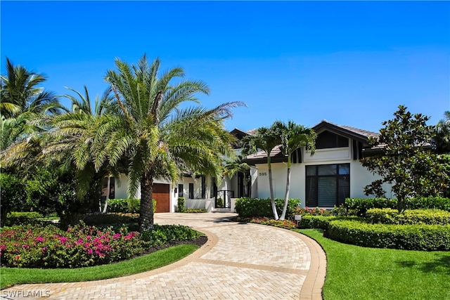 view of front of home with a garage