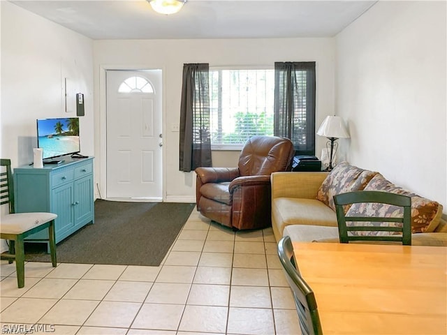 living area with light tile patterned floors