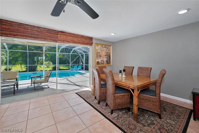 dining room featuring light tile patterned flooring, a wealth of natural light, and ceiling fan