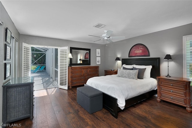 bedroom with dark hardwood / wood-style floors, access to outside, and ceiling fan