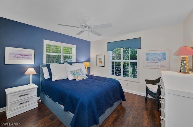 bedroom featuring ceiling fan and dark hardwood / wood-style flooring