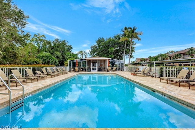 view of swimming pool featuring a patio area