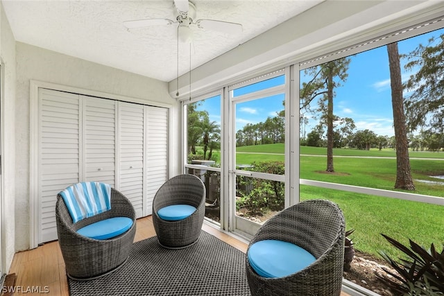 sunroom / solarium with ceiling fan