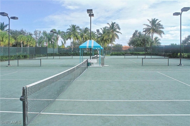 view of sport court with a gazebo and fence