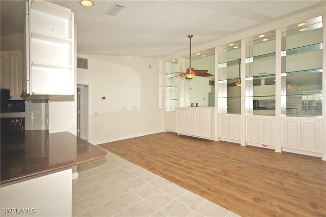 interior space featuring light wood-type flooring, visible vents, a ceiling fan, and recessed lighting