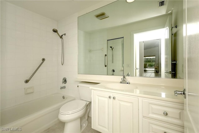 bathroom with toilet, vanity, visible vents, shower / washtub combination, and tile patterned floors