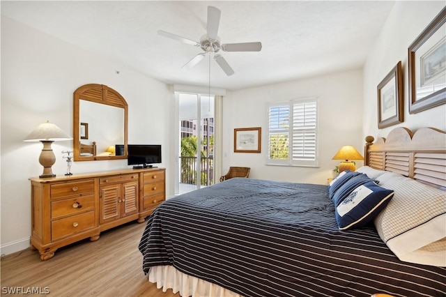 bedroom with light hardwood / wood-style flooring, access to outside, and ceiling fan