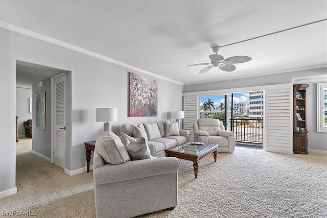 living room featuring crown molding, light carpet, and ceiling fan