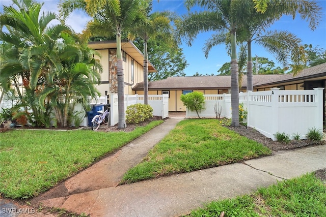 view of front of house with a front yard