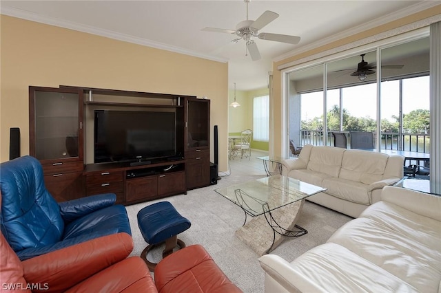 carpeted living room featuring ceiling fan and ornamental molding