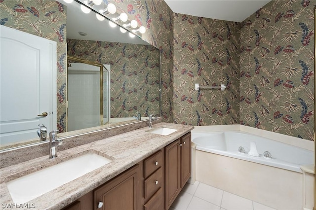 bathroom featuring tile patterned floors, plus walk in shower, and vanity