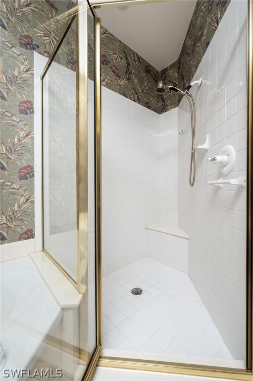 bathroom featuring an enclosed shower