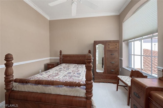 bedroom with crown molding and ceiling fan