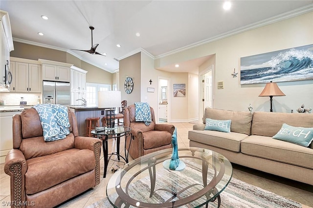 living room with crown molding, lofted ceiling, light tile patterned floors, and ceiling fan