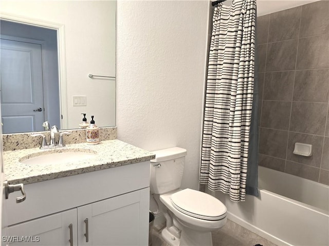 full bathroom with shower / tub combo with curtain, toilet, and vanity