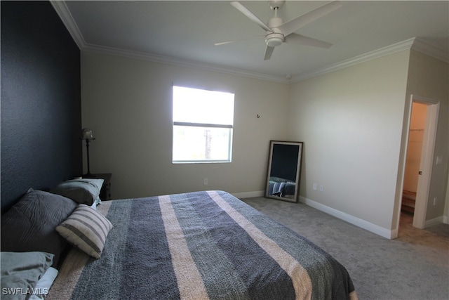 bedroom with carpet, ornamental molding, and ceiling fan