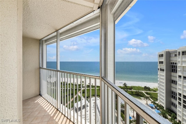 balcony featuring a water view