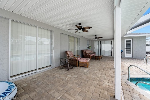 view of patio with ceiling fan