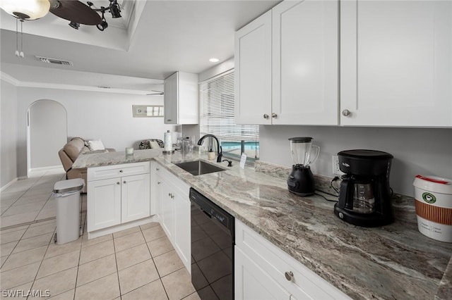 kitchen featuring white cabinets, sink, ceiling fan, black dishwasher, and kitchen peninsula