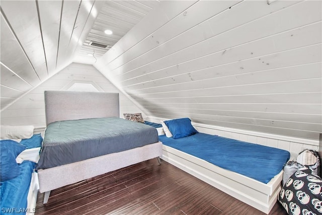 bedroom with lofted ceiling, wood-type flooring, wood walls, and wood ceiling