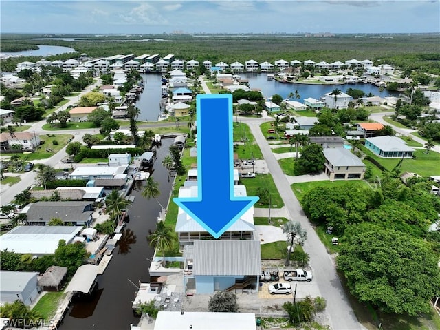 bird's eye view with a water view
