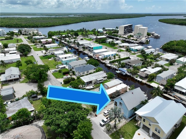bird's eye view with a water view