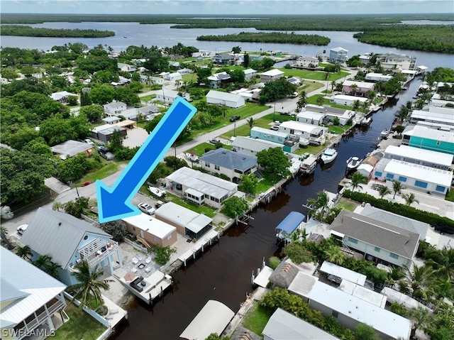 drone / aerial view featuring a water view
