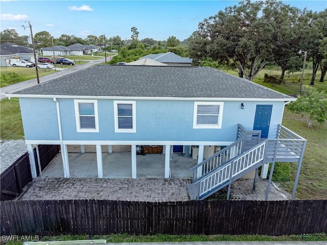 rear view of house with a patio area