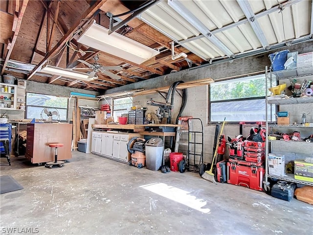 garage with a workshop area