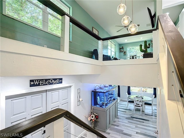 stairway featuring hardwood / wood-style floors