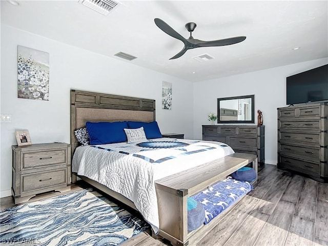 bedroom with light wood-type flooring and ceiling fan