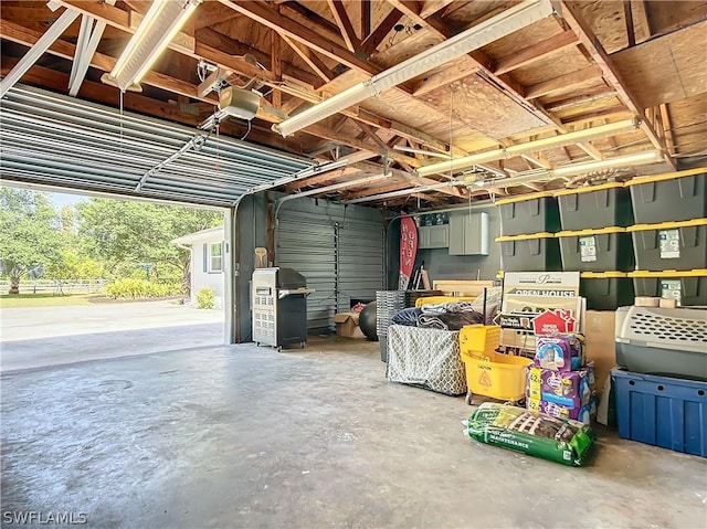 garage featuring a garage door opener