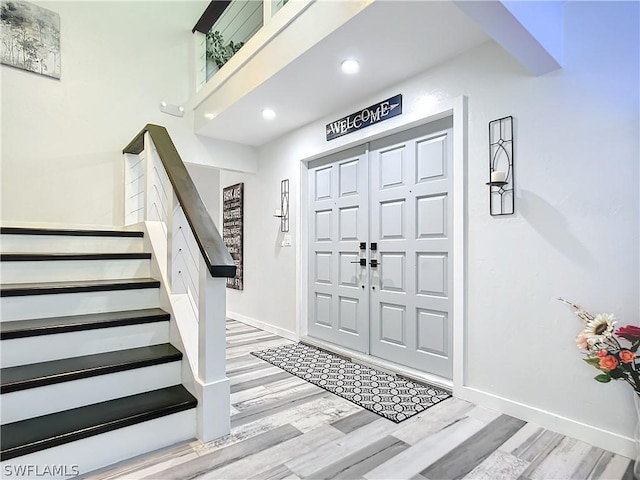 entrance foyer featuring light hardwood / wood-style floors