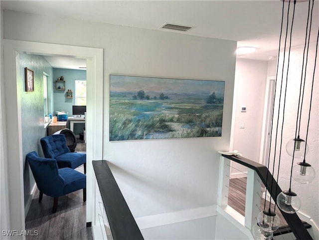 15711 Anderson Ln, Fort Myers, FL 33912 - hallway featuring wood finished floors and a desk