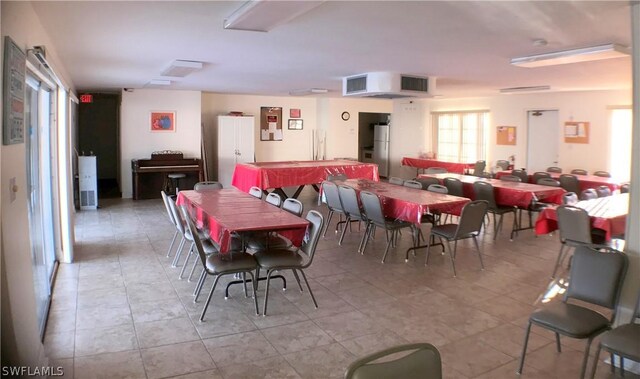 dining room featuring light tile patterned floors