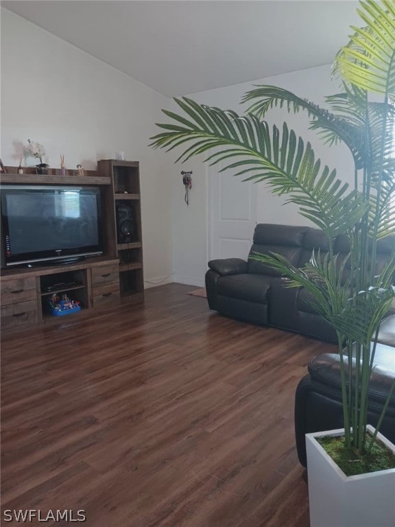 living room featuring dark hardwood / wood-style floors