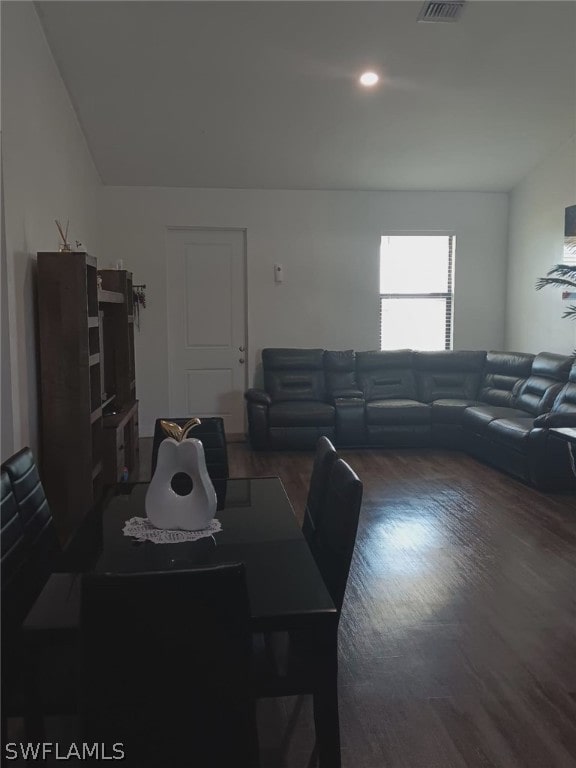 dining area featuring dark hardwood / wood-style floors