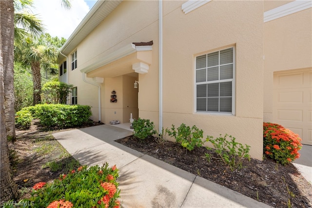 property entrance featuring a garage