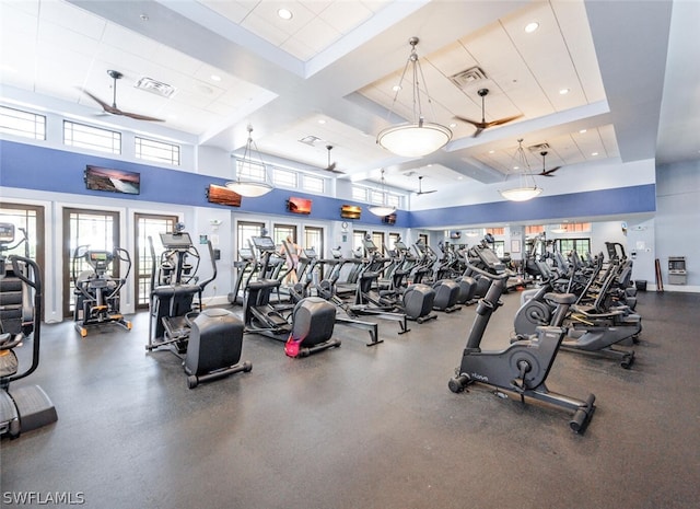 gym featuring a high ceiling