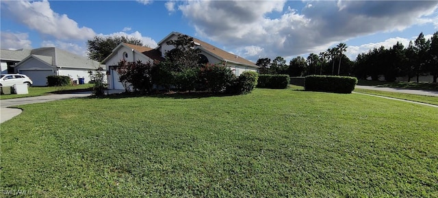 view of yard with a garage