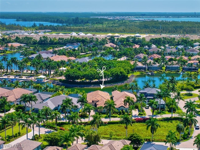 drone / aerial view with a water view