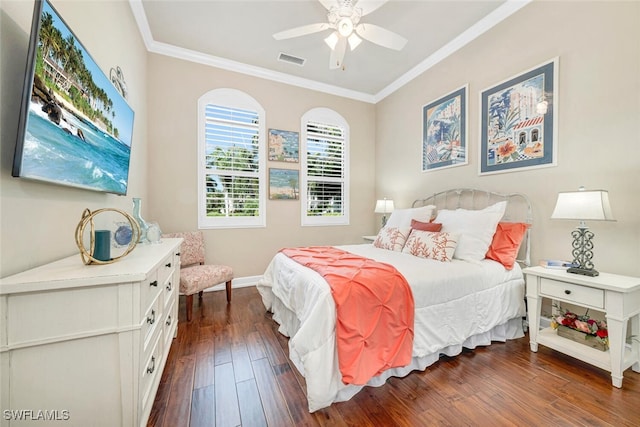 bedroom featuring ceiling fan, dark hardwood / wood-style floors, and crown molding