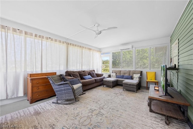 sunroom / solarium featuring ceiling fan and a wall mounted air conditioner