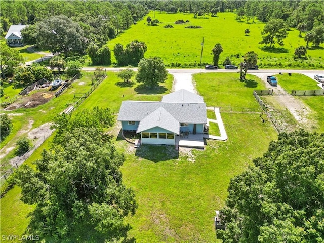 birds eye view of property featuring a rural view