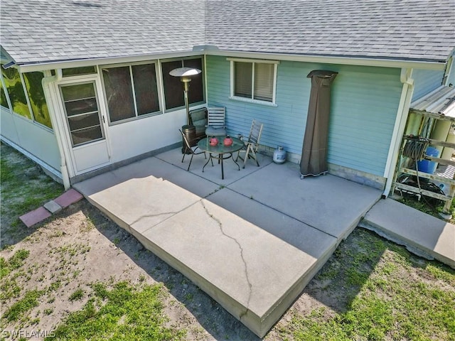 view of patio / terrace featuring a fire pit