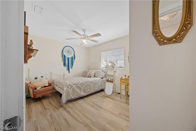 bedroom featuring ceiling fan and light wood-type flooring