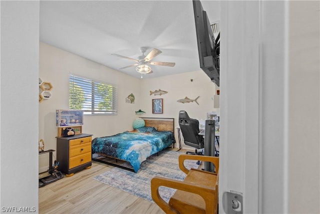 bedroom featuring ceiling fan and light wood-type flooring