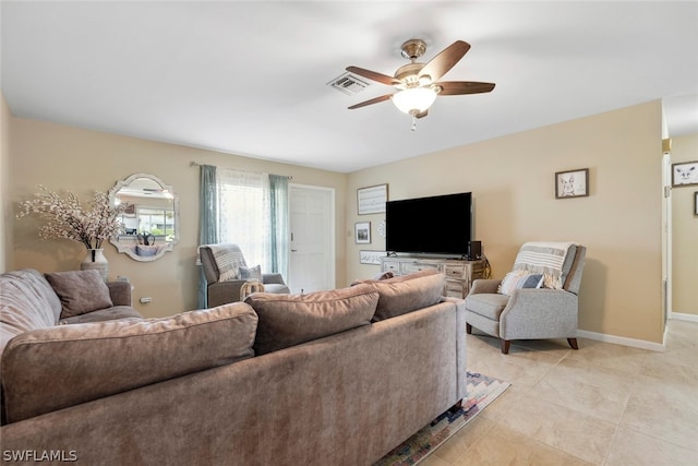 living room featuring ceiling fan and light tile patterned floors